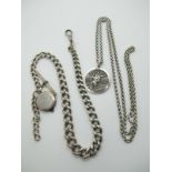 A Hallmarked Silver Albert Chain, graduated links, suspending T-bar pendant, and a SOS talisman (