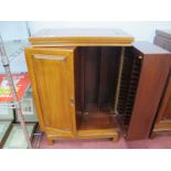 A Chinese Style Hardwood, C.D Cabinet, with hinged panelled doors, 60cm wide.