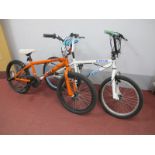 Two BMX Bikes, both X rated, one in orange, the other white. (2).