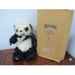 A Merrythought Panda, limited edition 191/500, boxed.