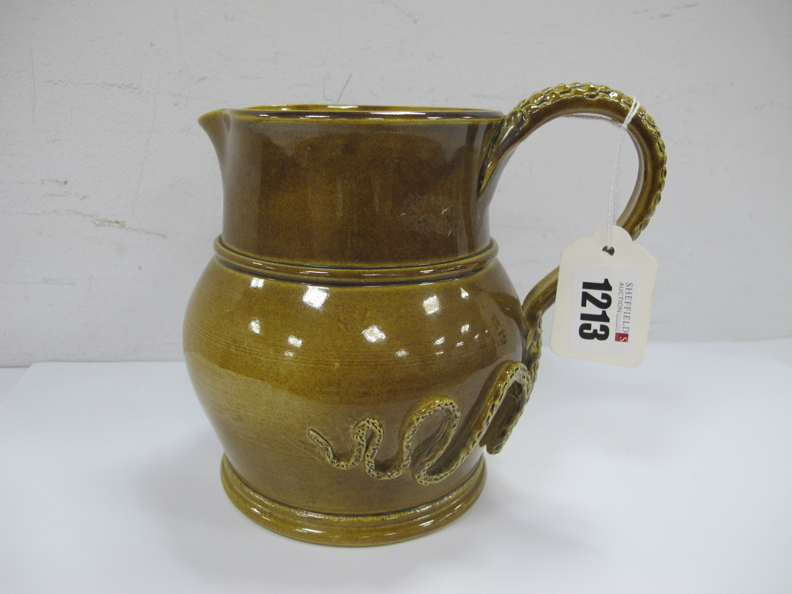 Tobin Green Glaze Jug, with reptile skin effect handle fanning out to body, 6206 and name under