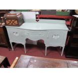 A Painted Serpentine Shaped Sideboard, with a low back, central drawer, flanking heat shaped