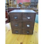 A Circa 1930's Table Top Filing Cabinet, with metal loop and label handles to the two banks each