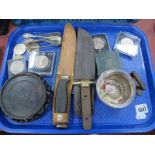 A 1935 Crown, plated sugar tongs, Bowie knife, other coins, etc:- One Tray.