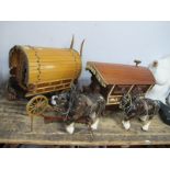 Two Handmaid Wooden Gypsy Caravans, with arched roofs, together with Melba pottery shire horses.