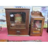 An Early XX Century Oak Smokers Cabinet, 29cm wide, with terracotta jar, another smaller. (2)