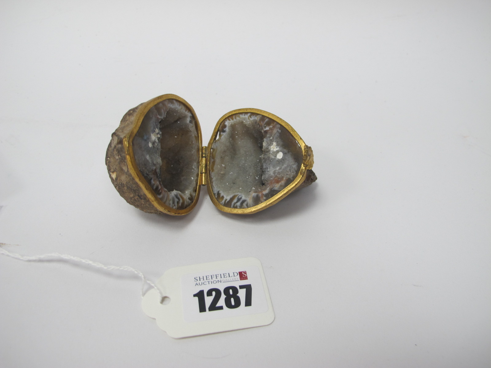 A Geode Mineral Trinket/Ring Box, with gilt metal mounts and hinge.