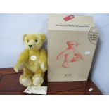 A Steiff 1909 Classic Teddy bear, gold plush with growler, with box, approximately 30cm high.