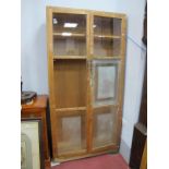 A Pine Bookcase, with glazed doors, 92cm wide x 184cm high.