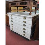 A XX Century White Painted Plan Chest, with six long drawers, with brass handles, on a plinth