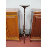 An Early XX Century Mahogany Plant Stand, with circular dish top, turned support and tripod legs,