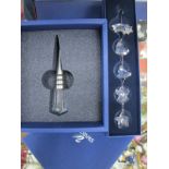 Swarovski, Sapphire wine stopper 11.5cm high and Christmas five drop ornament, both in original