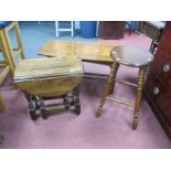 A Small Oak Drop Leaf Table, on turned and block support, united by stretchers.