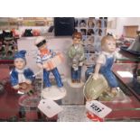 Royal Copenhagen Figure 153 Boy Sat Upon Melon 12cm high. 148 Boy Banging Drum. 758 Boy Holding Cat.