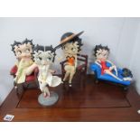 A Collection of Four Betty Boop Figurines, by King Features Syndicate, the tallest 27cm (one
