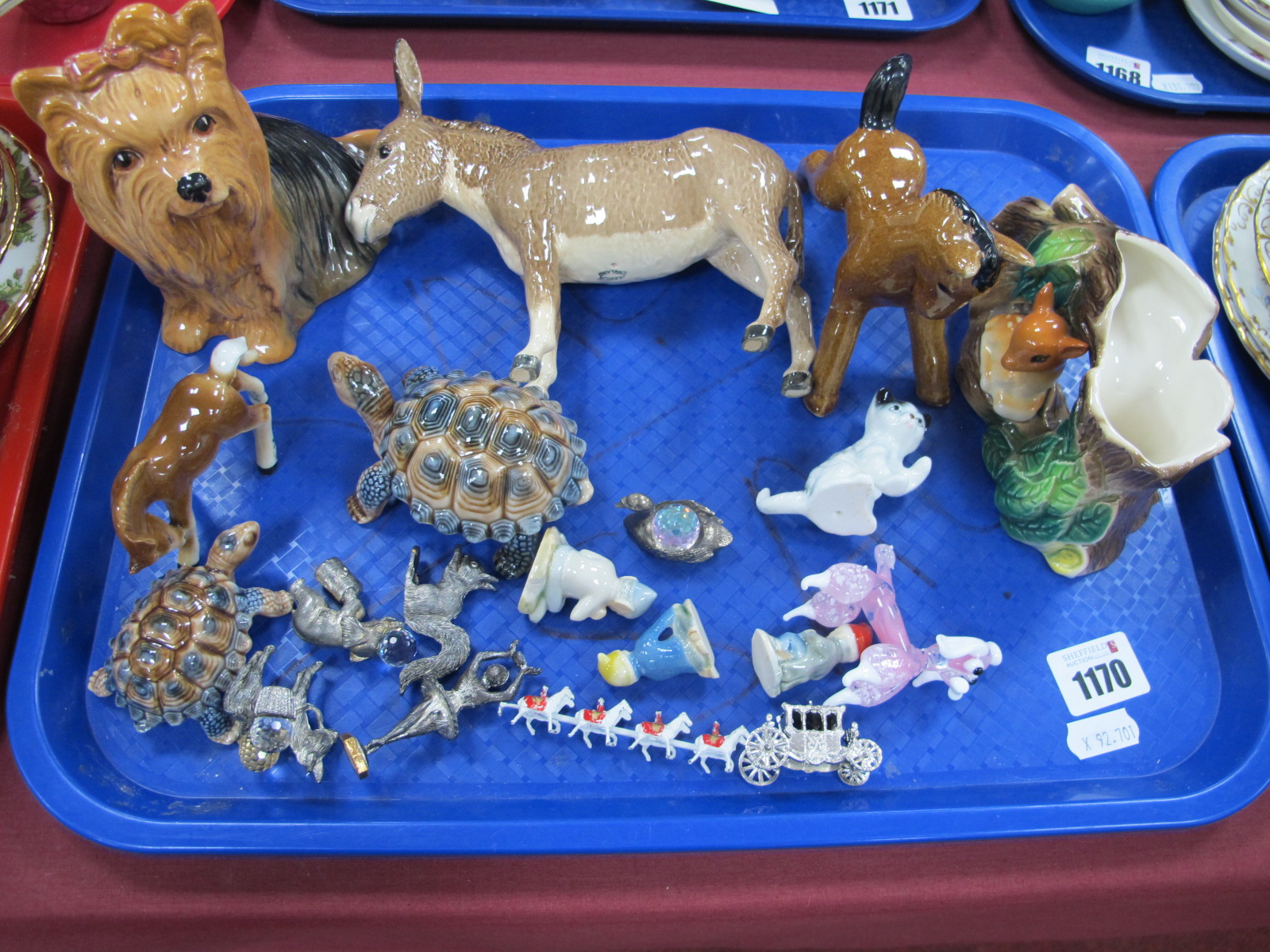 Beswick Donkey, Sylvac Yorkshire Terrier, Hornsea Fauna, Wade, metal figures, etc:- One Tray