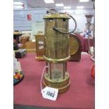 Aberaman Colliery Miners Lamp in Brass, 22cm high with handle down.