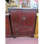 A Gent's Oak Dressing Cabinet, with hinged lid mirror, three sections for handkerchiefs, collars,