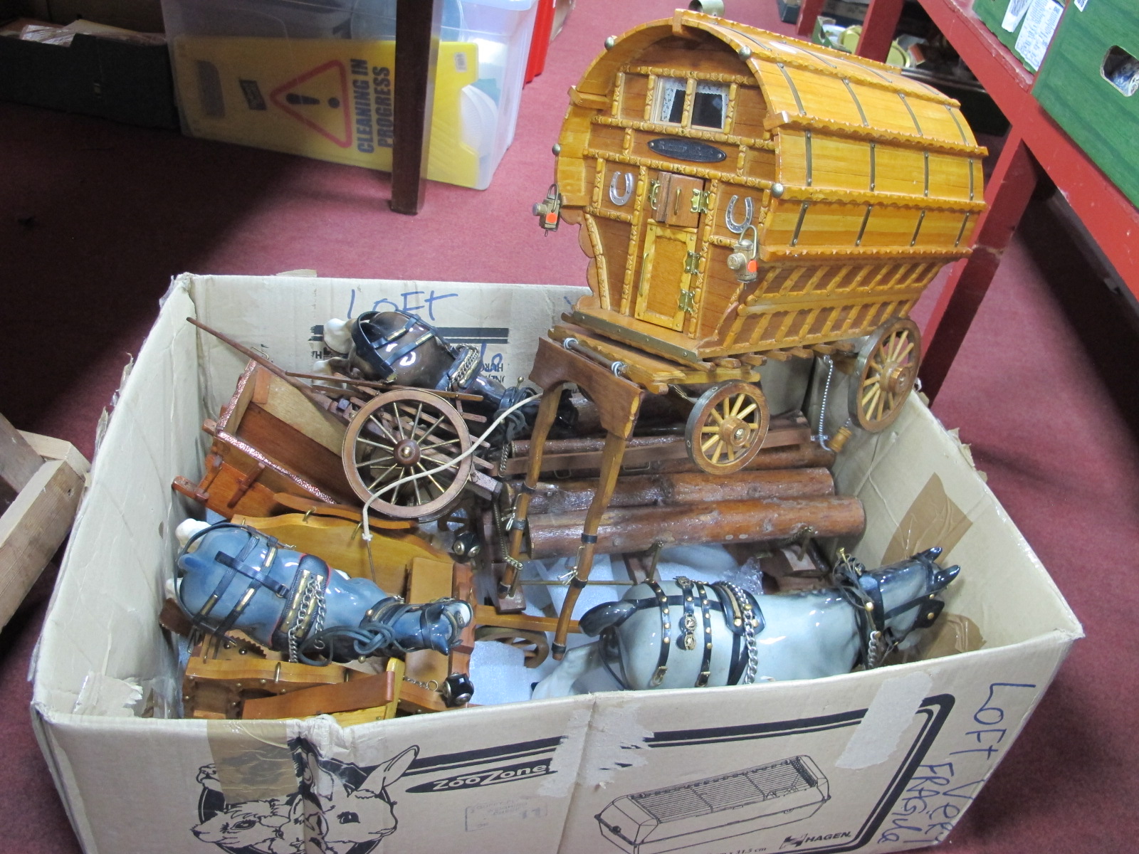 A Handmade Wooden Gypsy Caravan, with arch roof, four various wooden trailers, three pottery