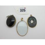 A Pietra Dura Oval Panel Pendant, detailed with floral spray; a 9ct gold mounted glazed oval