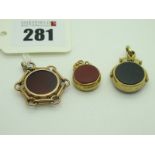 A 9ct Gold Hardstone Inset Fob Pendant, together with a 9ct gold mounted swivel fob pendant, etc.