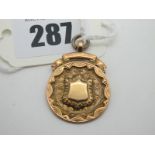 A 9ct Gold Medallion Pendant, (hallmark part obscured) engraved verso"Ossett & Dist A.F. League