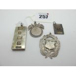 A Hallmarked Silver Ingot Pendant, together with a hallmarked silver medallion pendant "St Marys