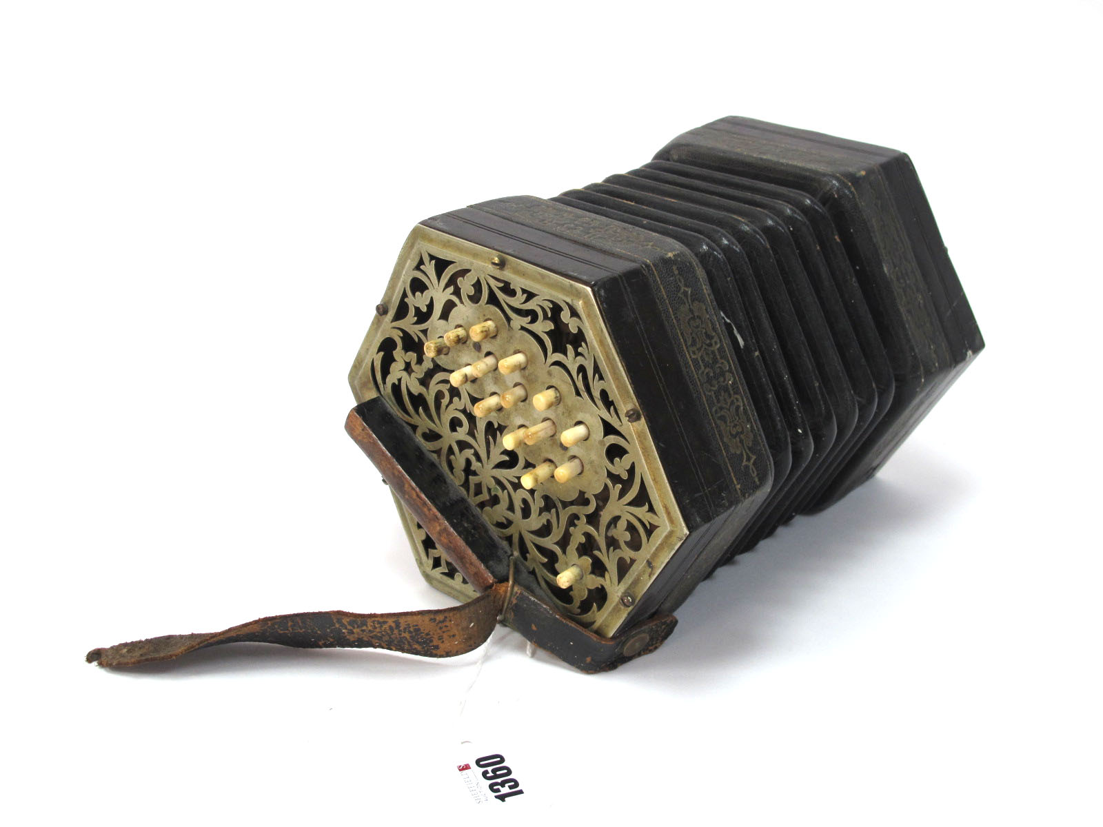 C. Jefferies Concertina, with thirty buttons (one absent), six section leather bellows, fret cut