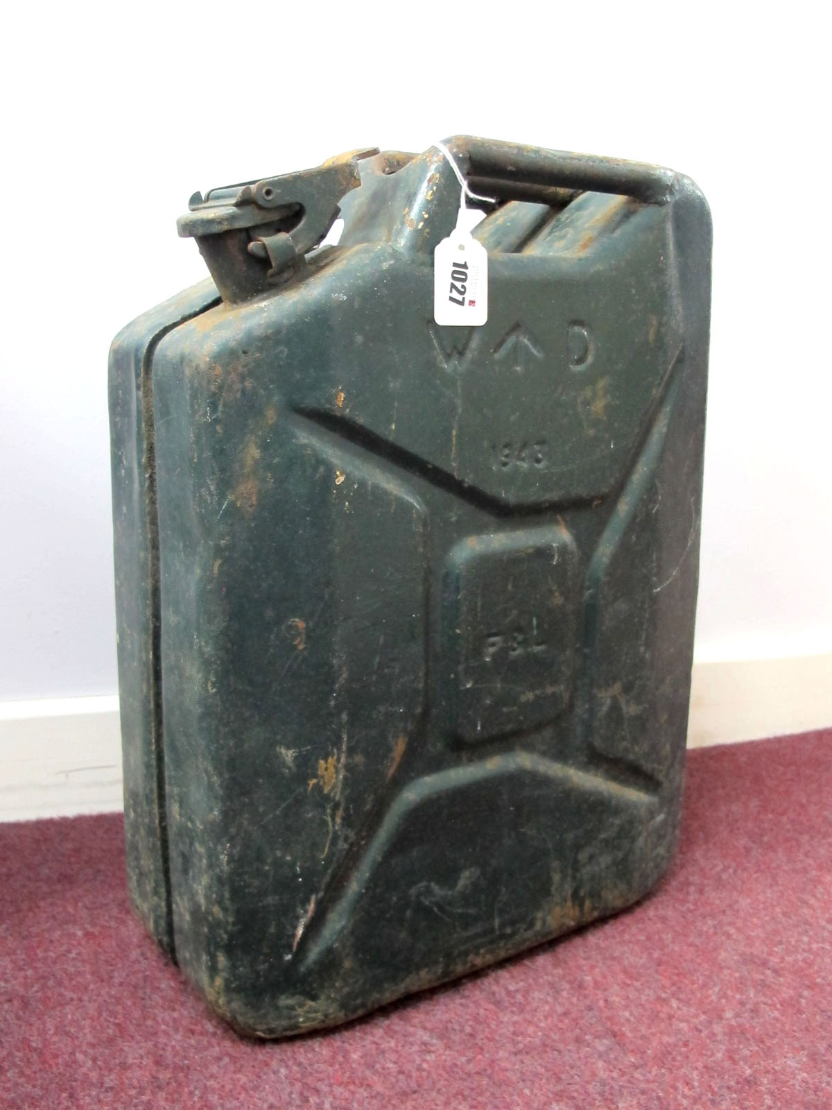A WWII Period Metal Jerry Can, green painted with military arrow and 'F & H' to body, 47cm high.