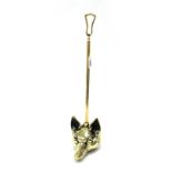 A Brass Door Stop, with elongated handle, the base as a fox head, 52.5cm high.