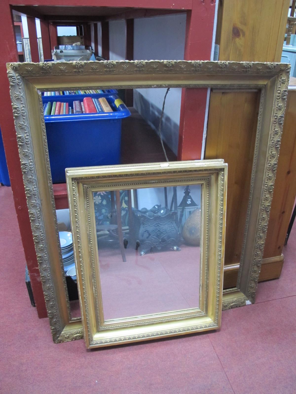 A Gilt Rectangular Framed Wall Mirror, 64 x 51.5cm, gilt picture frame 81 x 94cm (2).