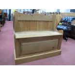 A Pine Bench, with lift-up seat revealing storage compartment, shaped sides, on plinth base, 84.