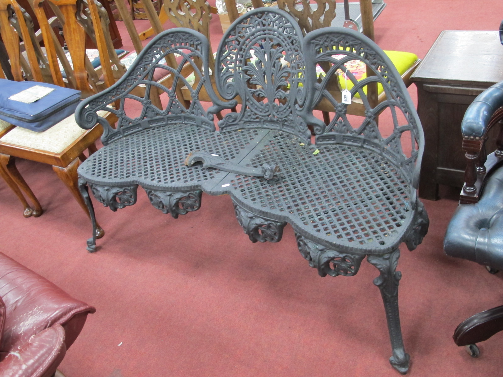 A XIX Century Style Painted Cast Iron Three Seater Garden Seat, with pierced back and seat, on