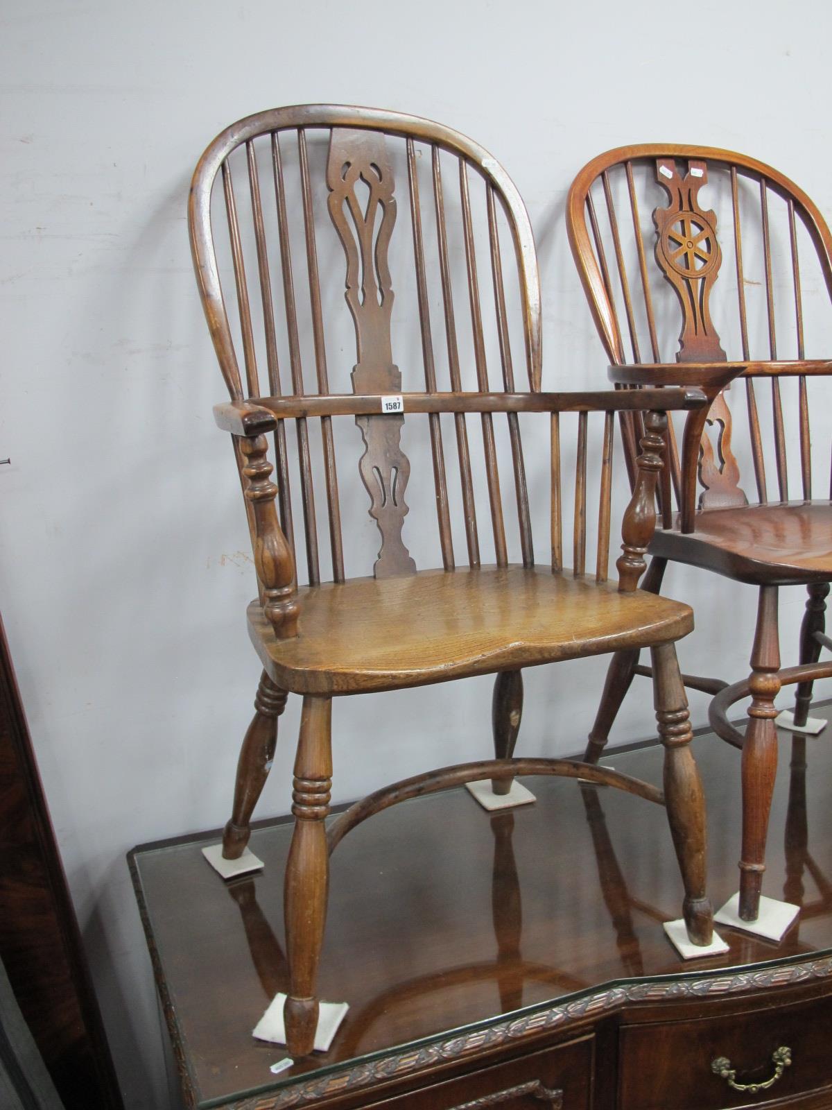 A XIX Century Yew-elm Windsor Chiar, with a hooped back rail, pierced splats on turned legs,