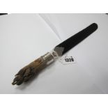 An Early XX Century Ebony Page Turner, with animal claw handle, silver hallmarked band with