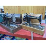 2 x Singer Sewing Machines, in oak dome cases.