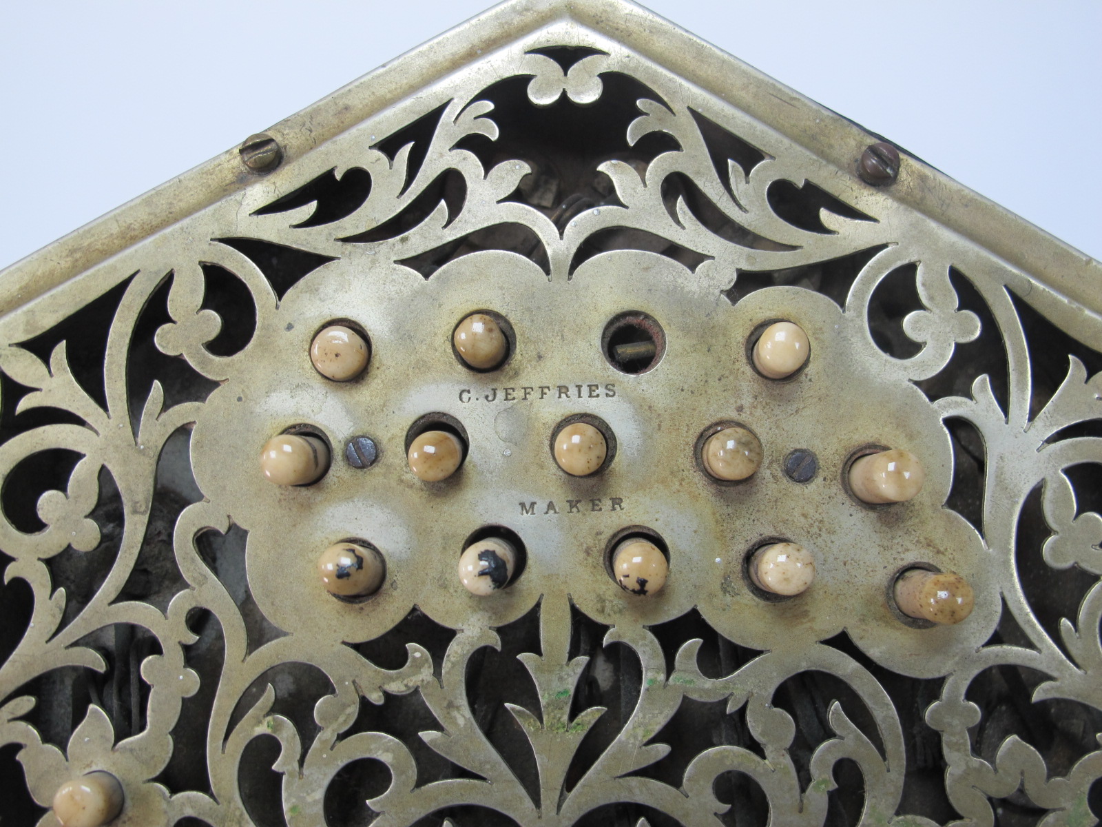 C. Jefferies Concertina, with thirty buttons (one absent), six section leather bellows, fret cut - Image 4 of 6