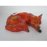 A Lorna Bailey Curled Fox Figure, gold signed, 12.5cm high.