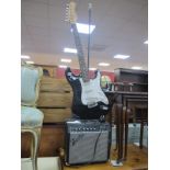 A Novelty Standard Lamp as a Fender Frontman 15G Amplifier with Burswood Guitar Surmounted on it,