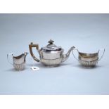 A Victorian Hallmarked Silver Three Piece Bachelor's Tea Set, Charles Stuart Harris, London 1888,