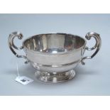 A Hallmarked Silver Twin Handled Bowl, William Comyns, London 1902, of plain design, inscribed "W.