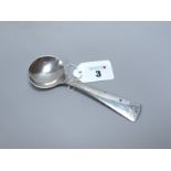 Georg Jensen; A Commemorative Spoon, "1872 1972", stamped "Georg Jensen" "Sterling Denmark".