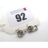 A Pair of Rose Cut Single Stone Diamond Earrings, illusion set on Continental style pierced hinged