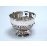 A Hallmarked Silver Footed Dish, (marks rubbed) of semi reeded form, 11cm diameter (110grams).