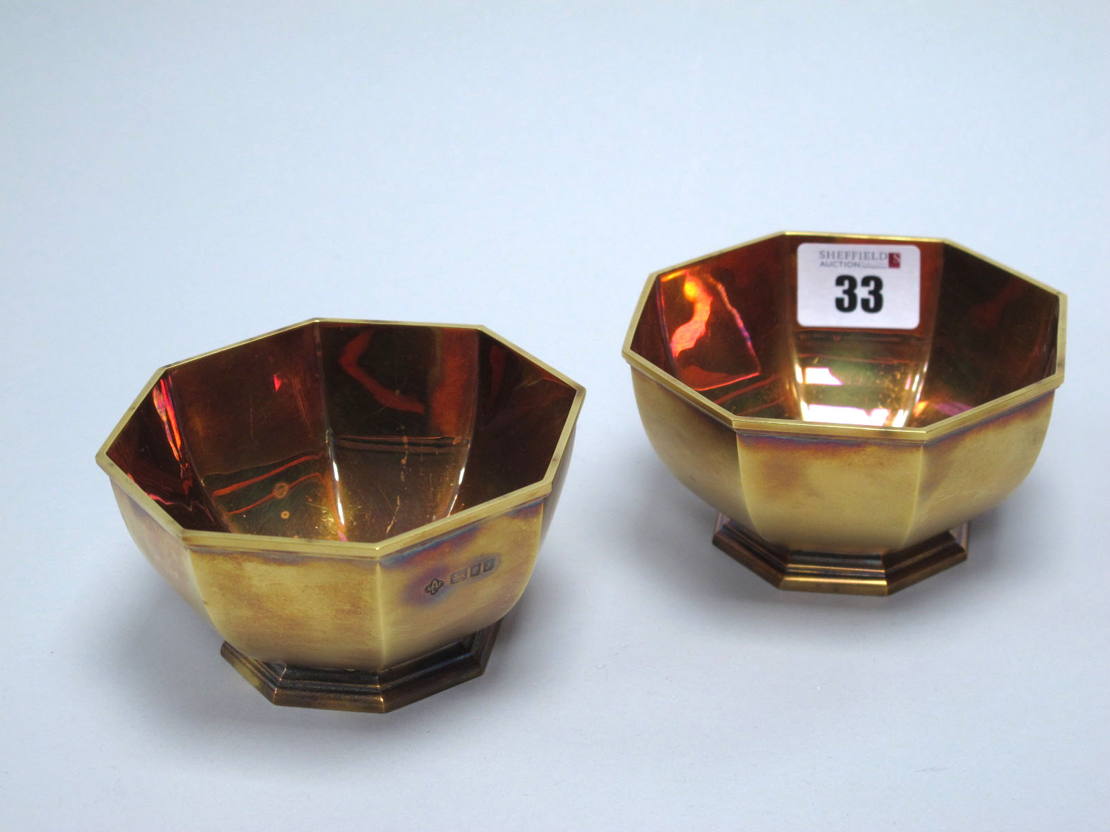 Asprey & Co; A Pair of Hallmarked Silver Gilt Octagonal Dishes, London 1964, of plain design,