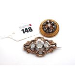 A Victorian Circular Locket Back Circlet Brooch, with collet set highlights; together with a