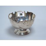 A Hallmarked Silver Footed Dish, HEB FEB, Chester 1912, with shaped rim, 11cm diameter (155grams).