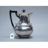 A Victorian Hallmarked Silver Lidded Jug, Martin, Hall & Co, Sheffield 1889, of semi reeded form