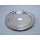 Hung Chong & Co; A Chinese Circular Tray, of plain design with textured border, raised on three