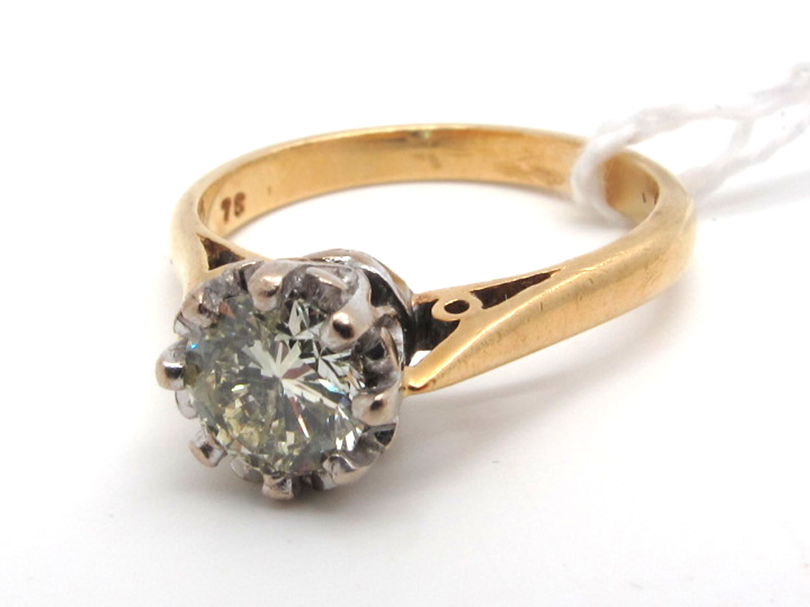 An 18ct Gold Single Stone Diamond Ring, the brilliant cut stone illusion claw set (finger size M) (